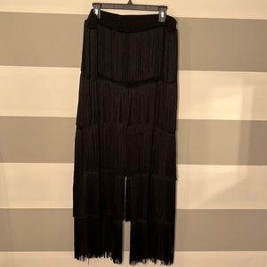 A fun alternative to the holiday dress with these elegant fringe pants!